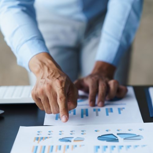 Businessmen working with graph data at office,Finance managers task,Concept business and finance